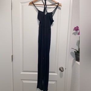 Dark Gray jumpsuit with string. Never worn.